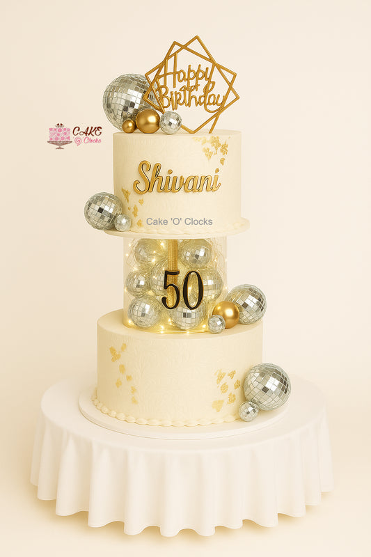 Golden 50th Birthday Revolving Cake